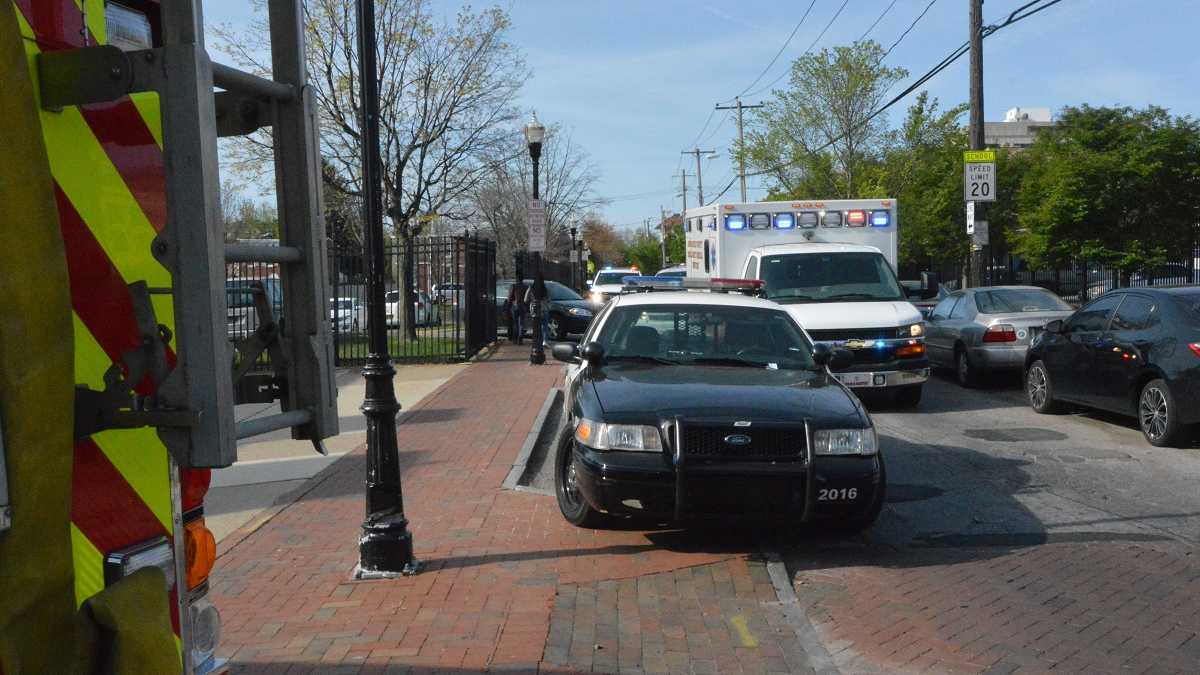  Police outside Howard High in Wilmington following the death of a student in April 2016. (File/WHYY) 