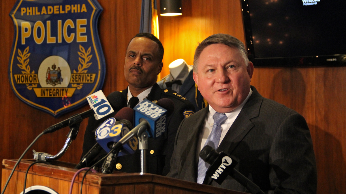  FBI Special Agent in Charge Ed Hanko (right) and Philadelphia Deputy Police Commissioner Richard Ross announce the arrest of a  fugitive suspected of brutally raping a woman in Philadelphia in 2010. (Emma Lee/WHYY) 
