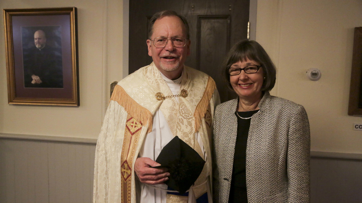 Father Leonard Klein of St. Patrick's in Wilmington, one of only about 100 married Catholic priests in the U.S., stands with his wife, Christa. (Kevin Cook/for Newsworks)