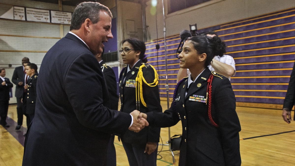  New Jersey Gov. Chris Christie shakes the hand of Camden High student and cadet Joselyn Chevere, 16. (Kimberly Paynter/WHYY) 