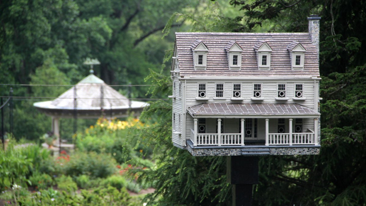 Thomas F. Burke recreated Canitoe Corners, Martha Stewart's home in Bedford N.Y., as a bird house. (Emma Lee/WHYY)
