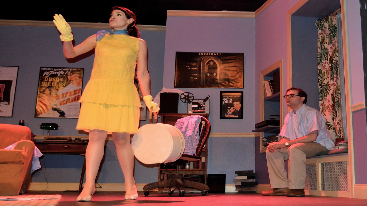  Nancy (Julia Wise) happily delivers bad news to former husband Allan Felix (James Lewis) in a scene from The Stagecrafters Theater’s production of “Play it Again, Sam.” 