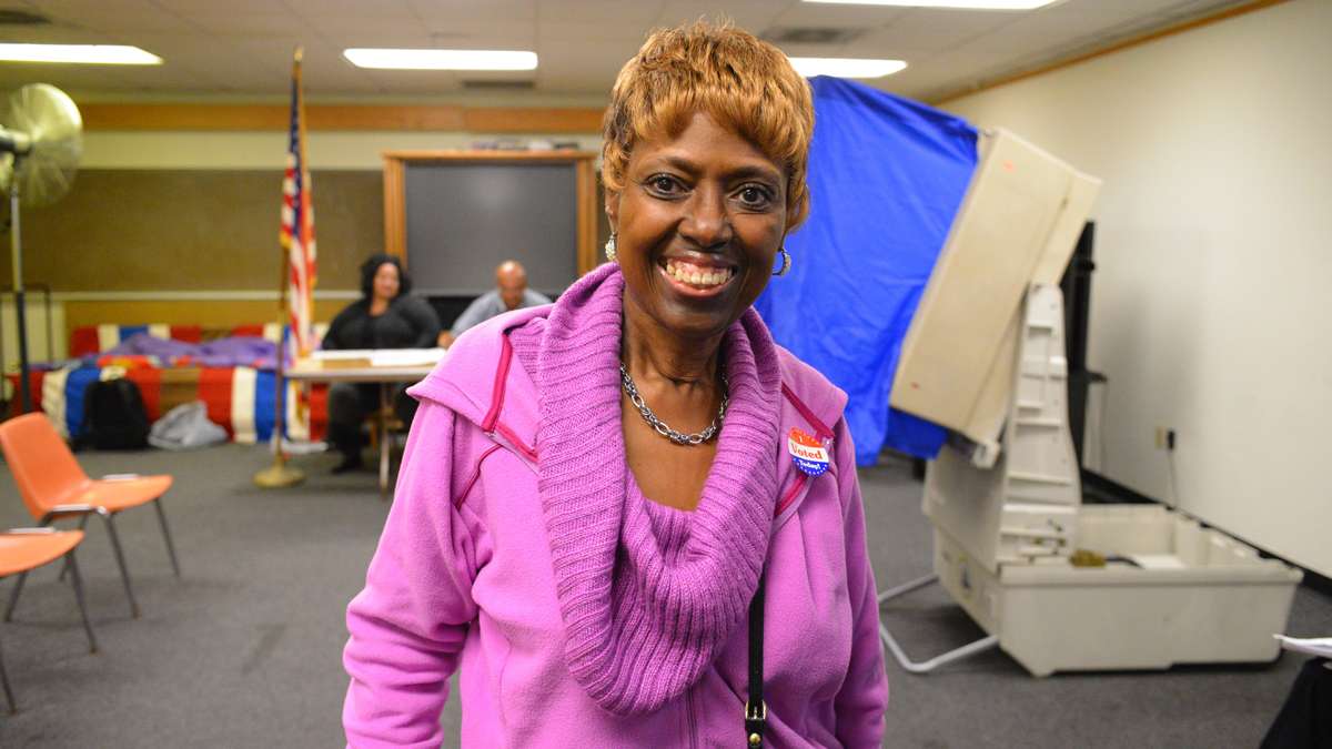 Lauren Huff of Germantown votes at the Joseph Coleman branch of the Free Library on Tuesday morning. (Bas Slabbers/for NewsWorks)