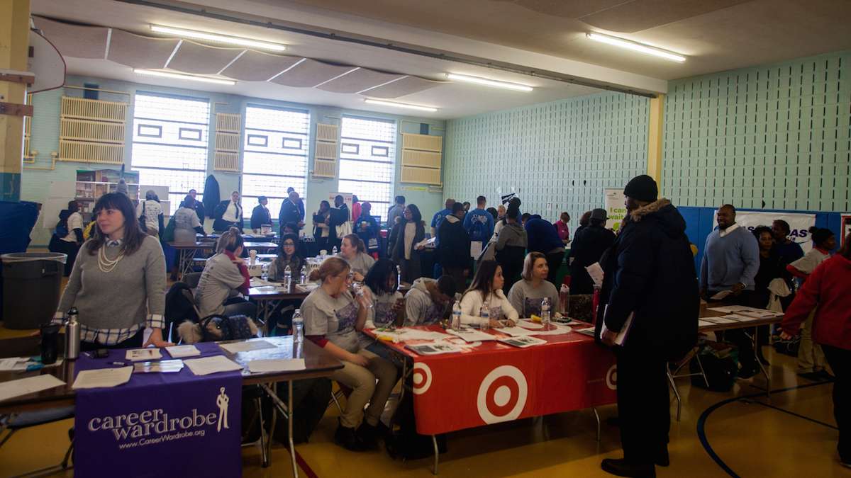 Philadelphians walk through a job and services fair at Girard College on Martin Luther King Day 2017. (Brad Larrison for NewsWorks)