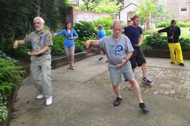  Zak's students in Mt. Airy move through their practice as a whole group. (Michelle Zei/for NewsWorks) 