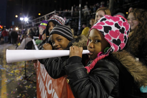 <p>Children watch the 113th annual Mummers Parade in Philadelphia, on Tuesday Jan. 1, 2013.  (AP Photo/Joseph Kaczmarek)</p>
