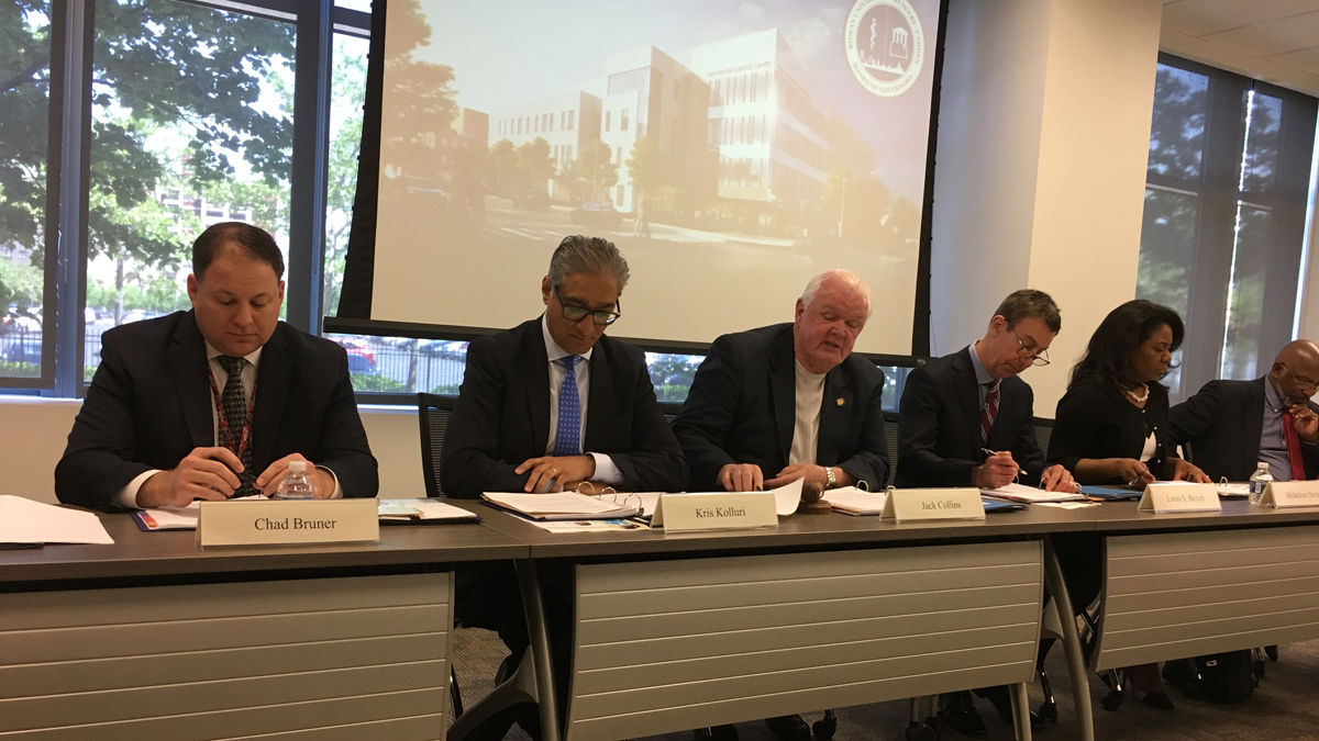  Kris Kolluri, (second from right) CEO of the Rowan University/Rutgers–Camden board of governors, says the goal is to train Alzheimer's journey coordinators with a strong understanding of the disease, but with an  individual-centered philosophy. (Anne Hoffman for NewsWorks) 