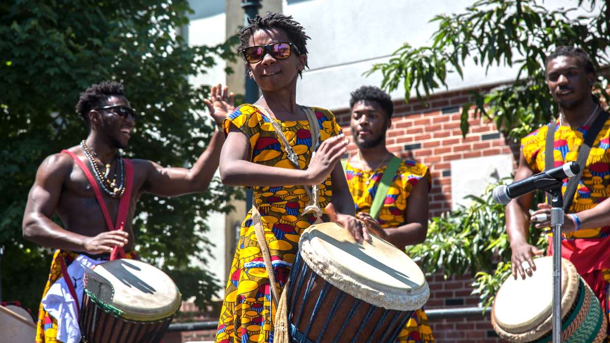 African Heritage Dancers and Drummers performer Kofi Hunt, 11, plays during the 42nd Annual Odunde Festival in Philadelphia. The dance group has performed at every festival since 1975.