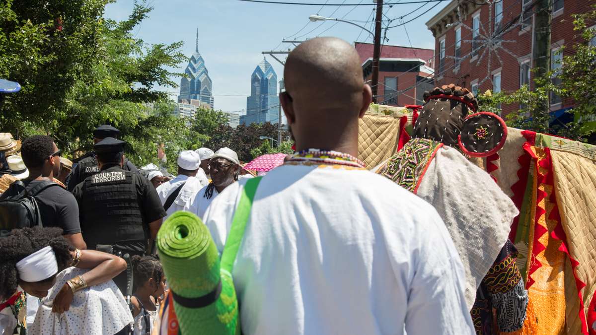 Counter-terrorism police patrol the festival grounds during the Odunde Festival.