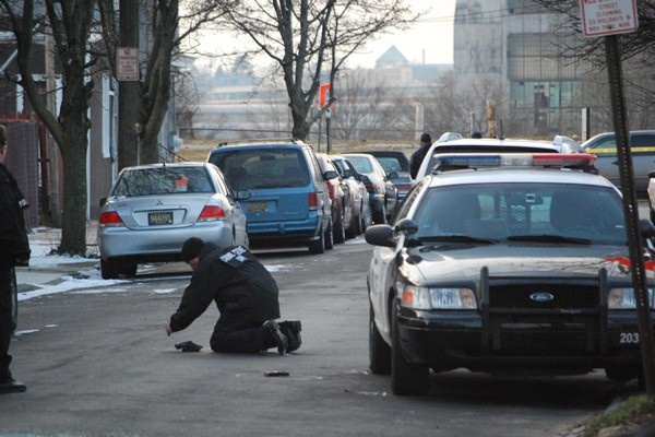 <p>Wilmington Police investigate the shooting involving one of their own Sunday afternoon. (John Jankowski/for NewsWorks)</p>
