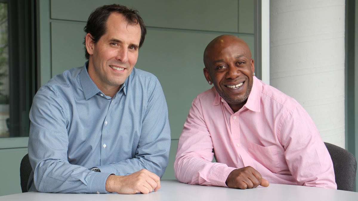  Mike Brady (left), CEO of Greyston Bakery and one of his employees, Dion Drew. (Emma Lee/WHYY) 