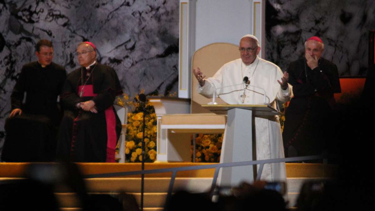 Festival of Families: Pope Francis gestures on stage at the Festival of Families in Philadelphia (KImberly Paynter/WHYY)