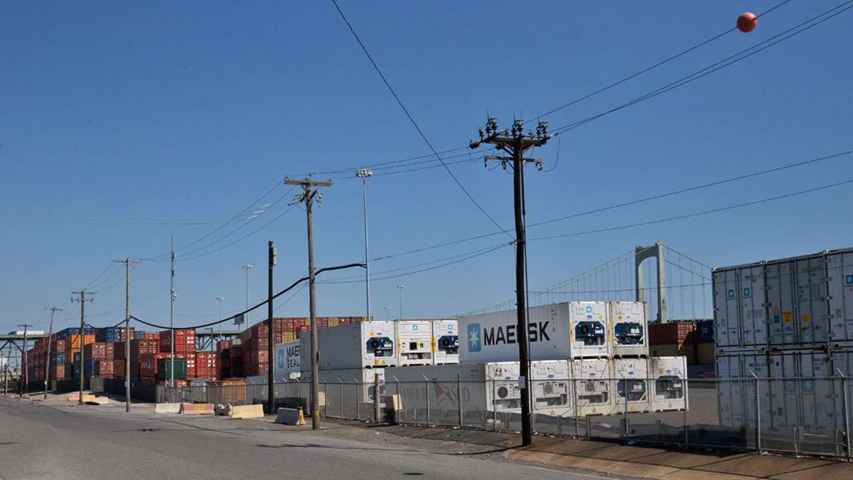 Rows of shipping containers stacked at Packer Marine Terminal near the Delaware River in Philadelphia, Pa. (Lindsay Lazarski/WHYY)