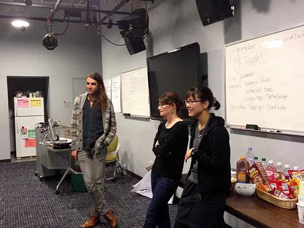 <p><p>Volunteers Matthew Graber and Erin Mishkin with PYR founder Yowei Shaw. (Jeanette Woods/ NewsWorks)</p></p>
