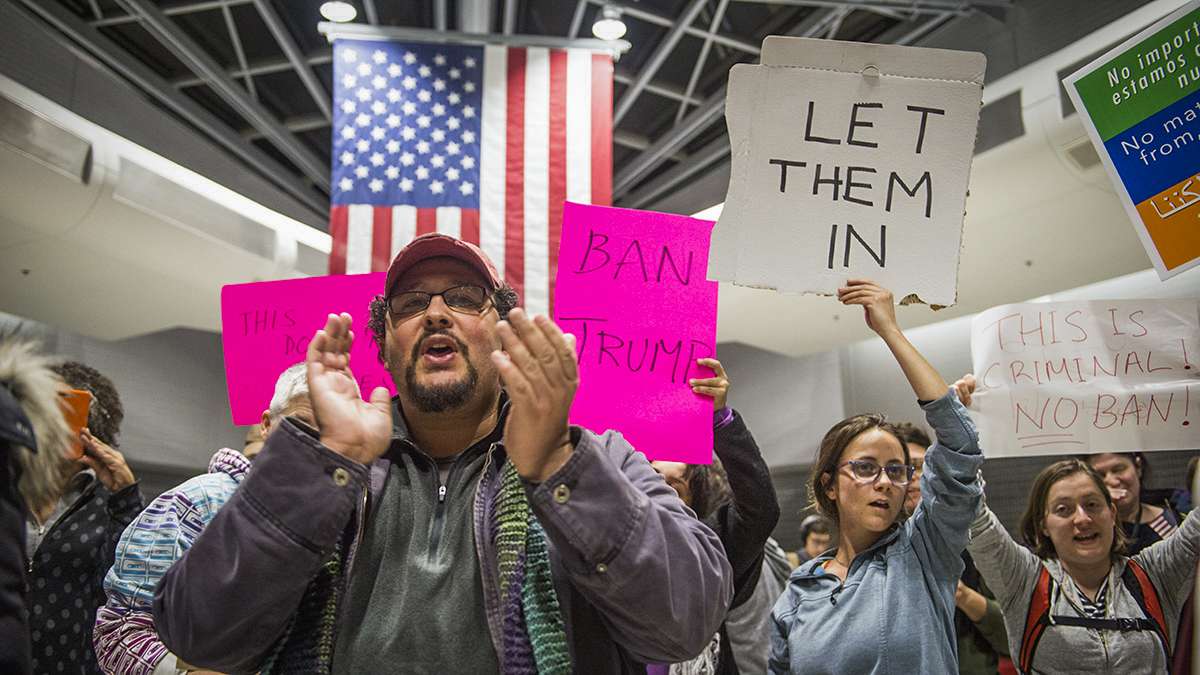 Protesters angered by President Donald Trump’s executive order that prevented refugees, visa and green card holders from entering the US chant pro-immigration slogans at Philadelphia International Airport.