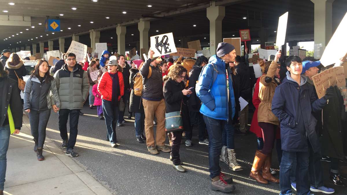 Scenes from the second day of actions at Philadelphia International Airport where people have come to protest President Trump's executive order detaining and deporting refugees. (Paige Pfleger/WHYY)