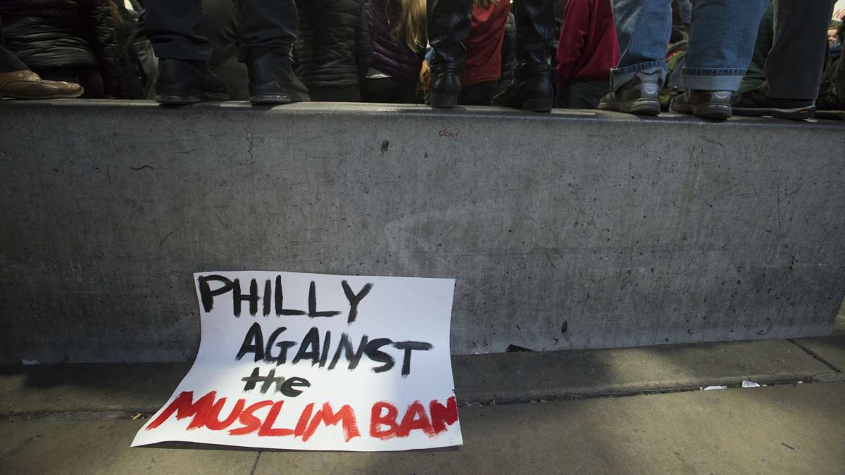 Scenes from the second day of actions at Philadelphia International Airport where people have come to protest President Trump's executive order detaining and deporting refugees. (Branden Eastwood for NewsWorks)