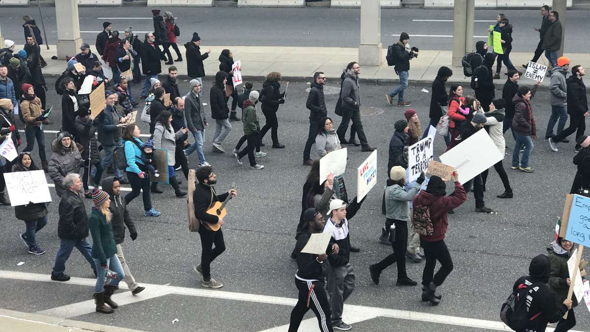 Scenes from the second day of actions at Philadelphia International Airport where people have come to protest President Trump's executive order detaining and deporting refugees. (Bastiaan Slabbers for NewsWorks)