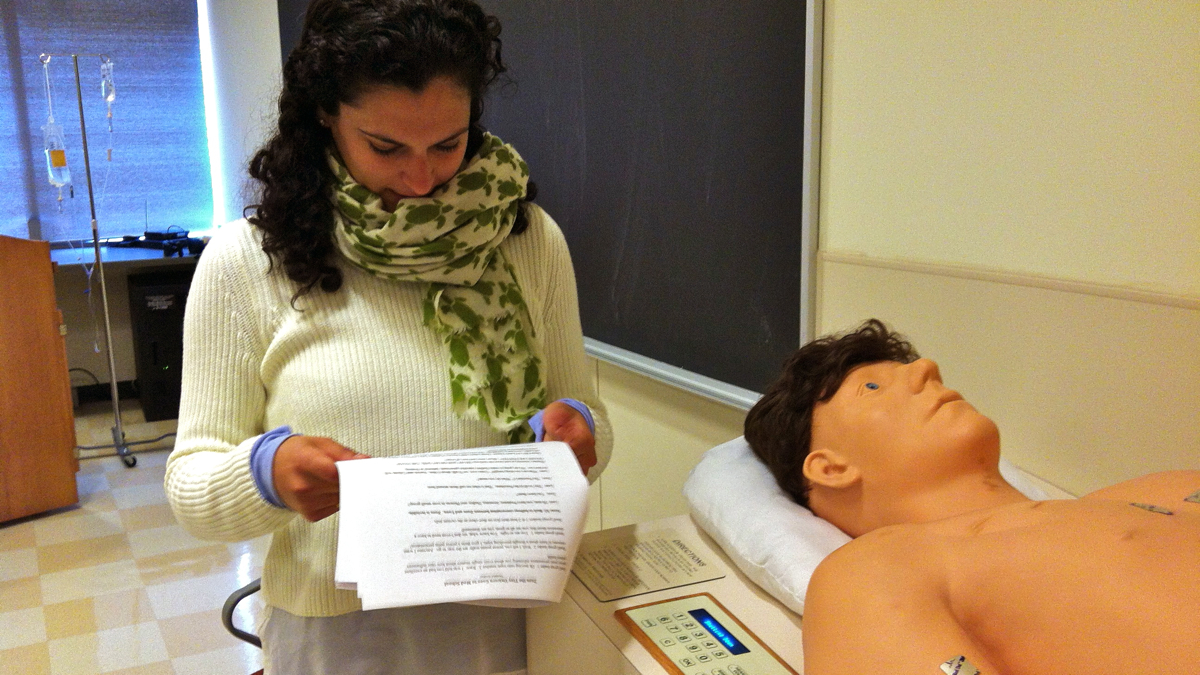 Second year medical student Yasmine Koukaz reads from a play she wrote in theater class. It's called 