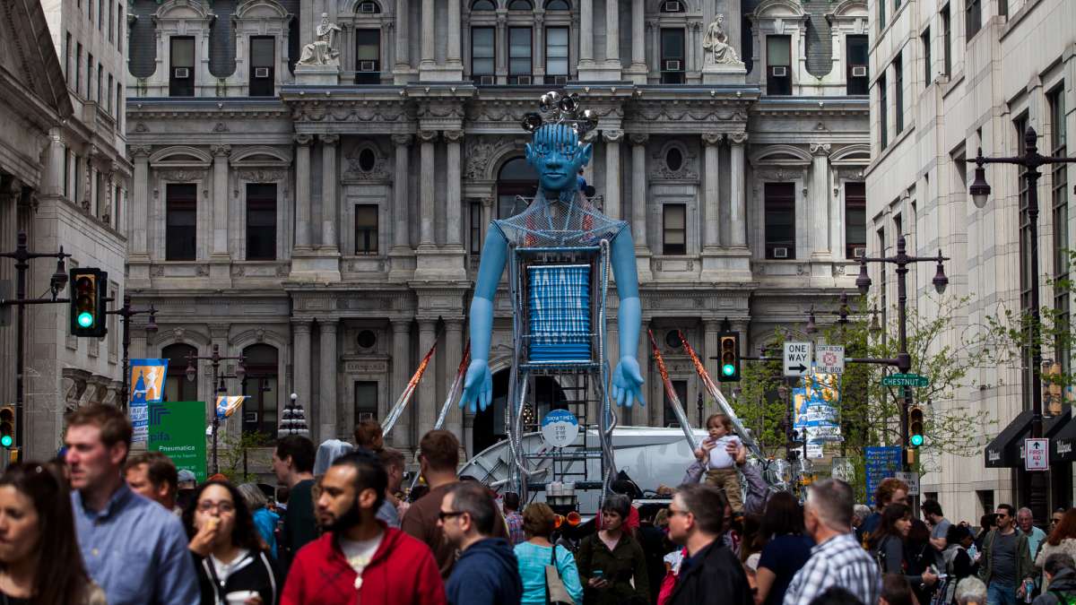 A statue stood above a stage at the northern end of the street fair at Broad and Chestnut Streets.