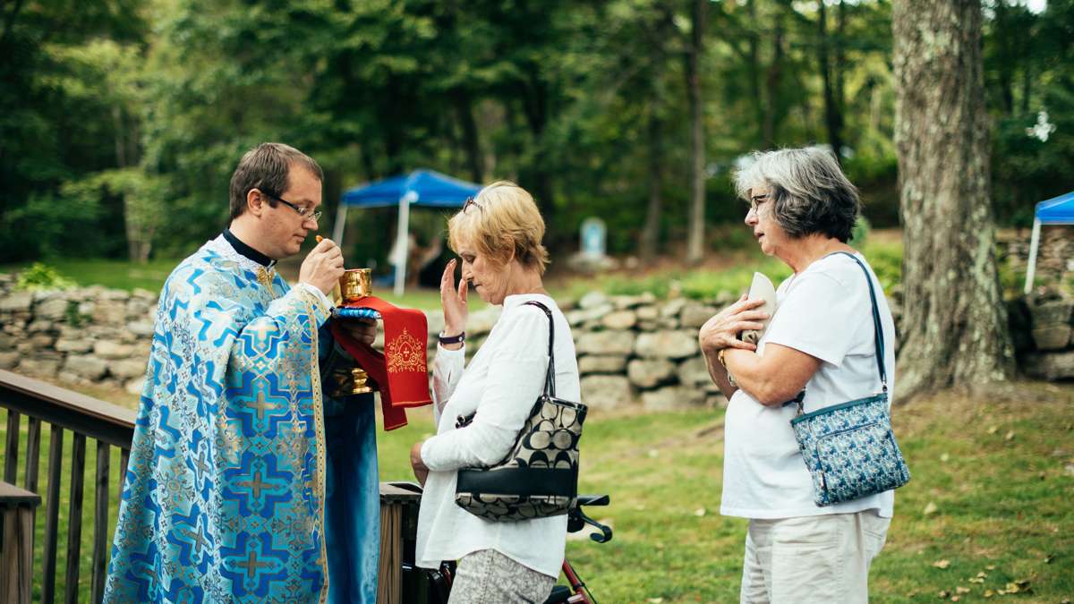 Communion is received inside and outside of the church to accomidate all of the pilgrims.