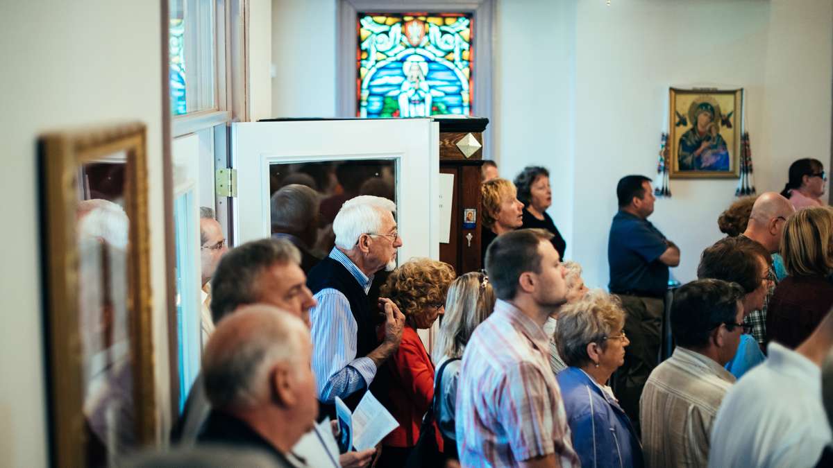 Parishioners pack the church for Divine Liturgy and more gathered outside the back door.