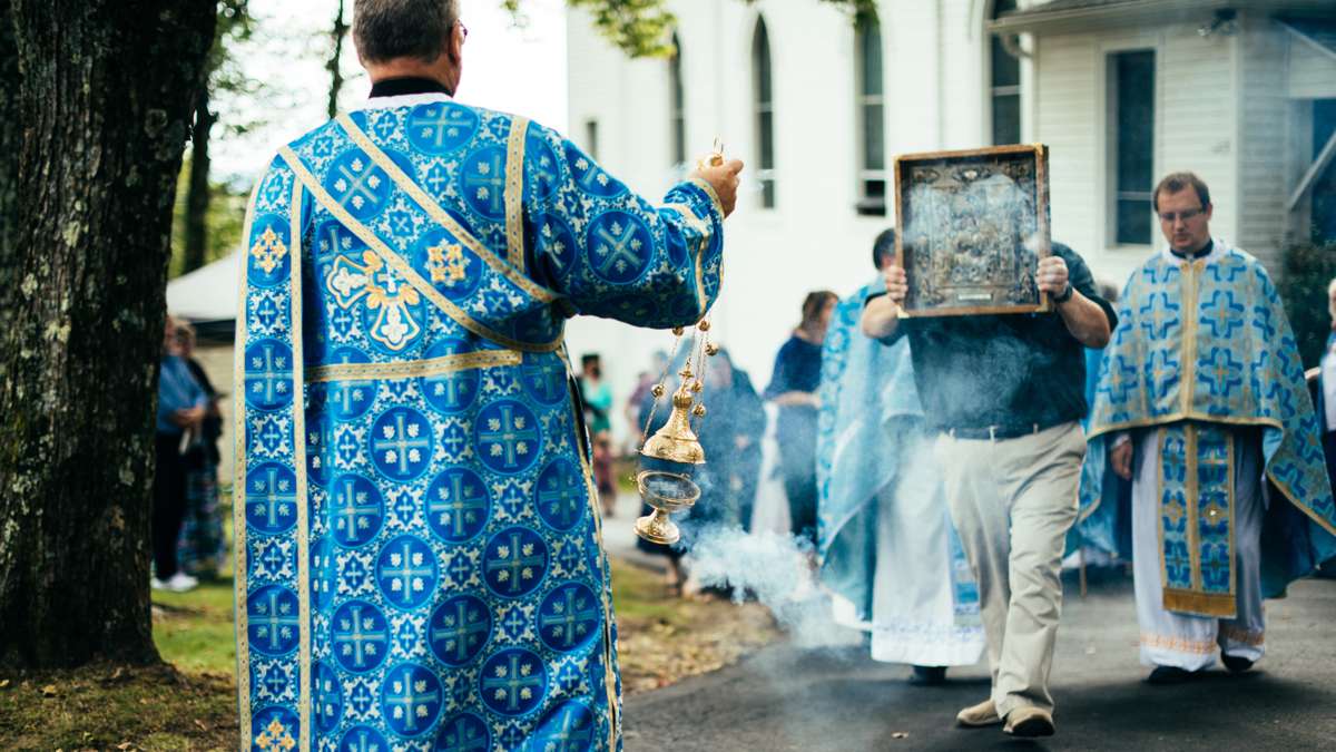 Worshipers process from the church following the Divine Liturgy with a replica of the Icon of Our Lady of Pochaiv to be placed in an outdoor chapel.
