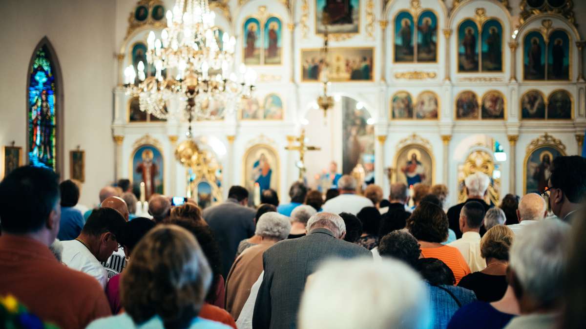 Parishioners bow their heads bowed during the Divine Liturgy.