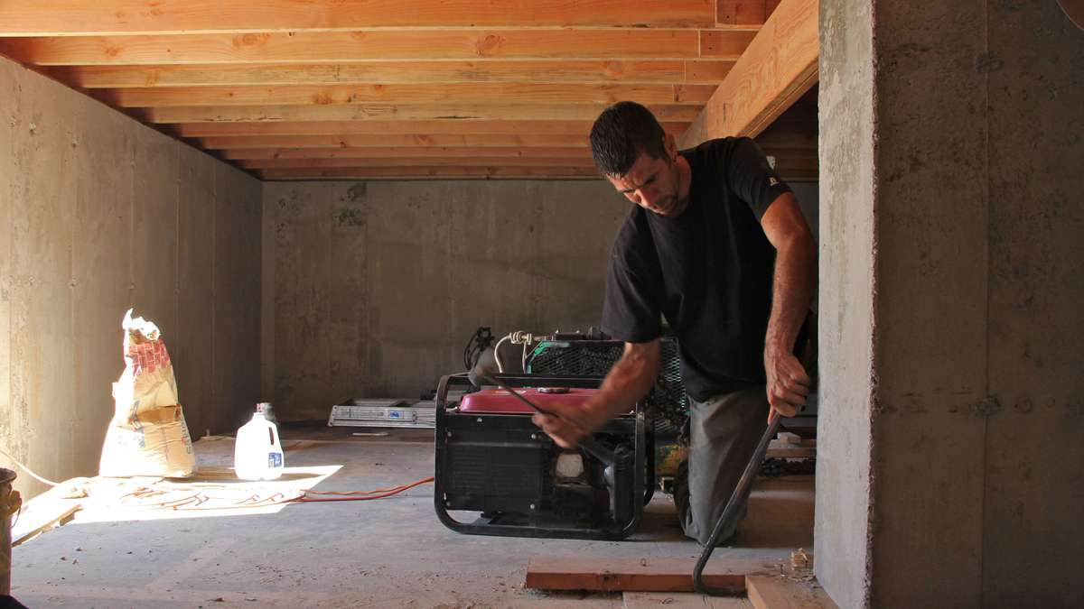 Contractor Jeffrey McGrath, a mason and carpenter, sees years of work ahead of him, raising New Jersey shore homes to comply with new regulations. (Emma Lee/for NewsWorks)