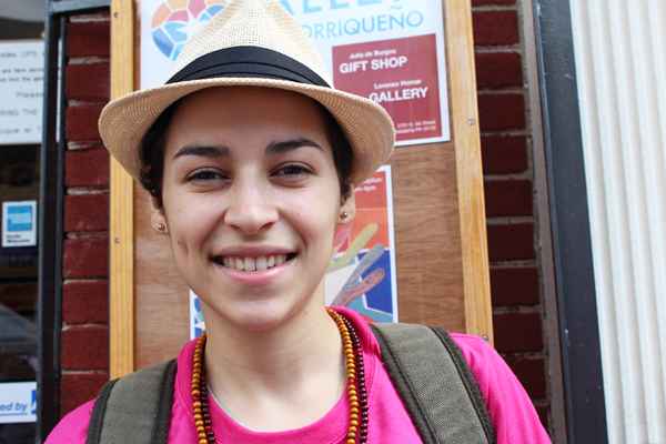Performance poet Denice Frohman recited her bilingual poem about people in the neighborhood, the things they care and talk about, and what they choose to ignore: their bodies, their health and particularly HIV testing.  (Elisabeth Perez-Luna/WHYY)