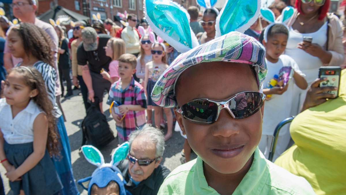 Edward Coleman poses in his Easter attire while sporting a pair of rabbit ears.