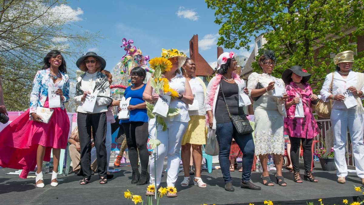 The contestants in the best-dressed woman category line the stage.