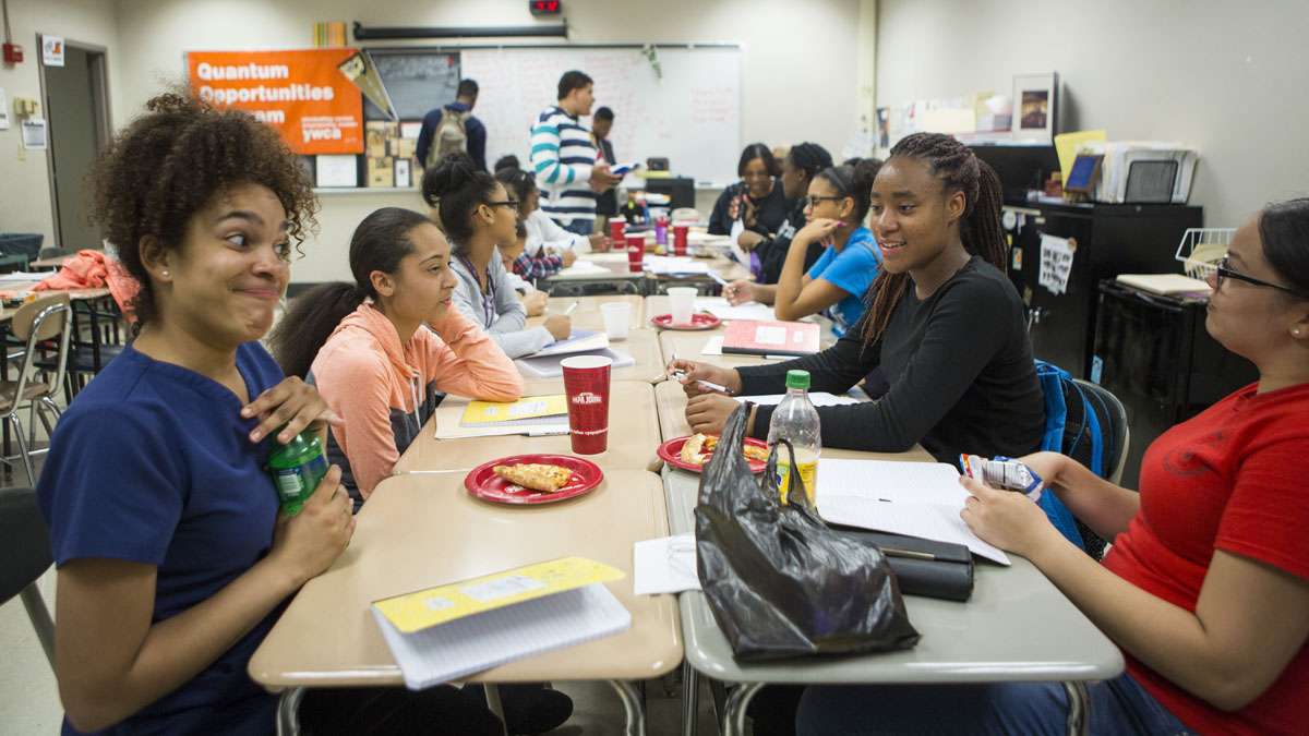 Liz Herrera-Reynoso, 14, left, and Escarleny Conce-Molina, 14, right, both students of York County School of Technology, attend the Quantum Opportunities program with kids from all over the county. The program’s after school sessions take place at William Penn High School in the city of York. (Jessica Kourkounis/For Keystone Crossroads)