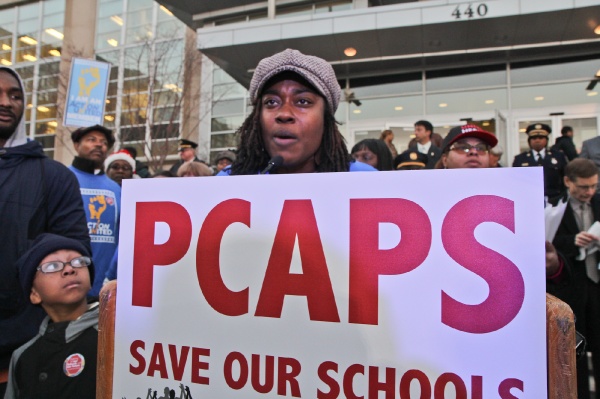 <p><p>Kia Hinton spoke of her fears for the education of her son Muhammad Nesbitt, 7. (Kimberly Paynter/WHYY)</p></p>
