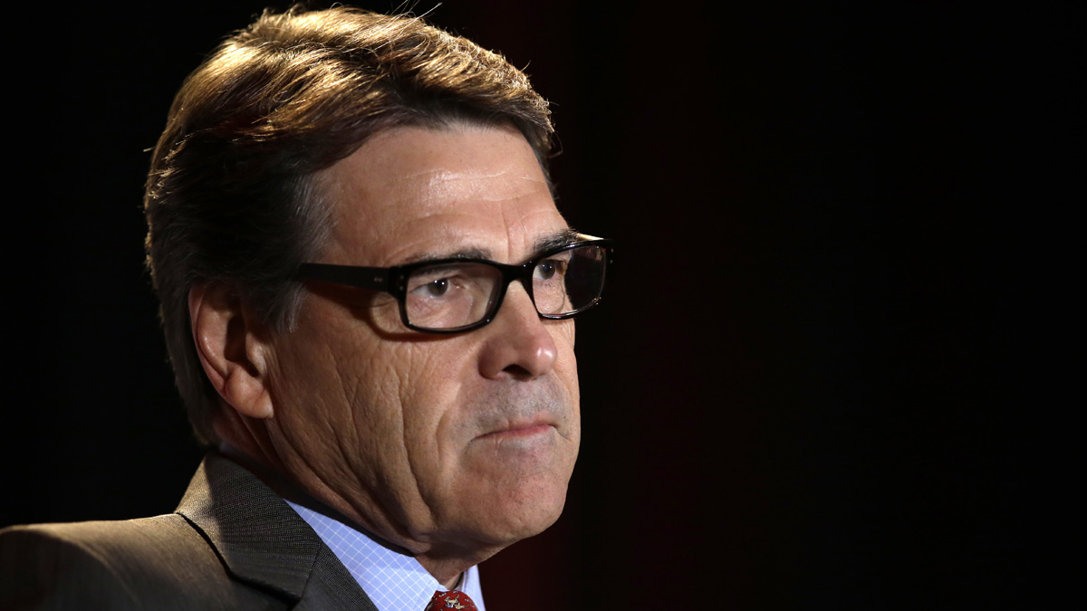  Governor Rick Perry pauses as he addresses attendees at the 2014 Red State Gathering, Friday, Aug. 8, 2014, in Fort Worth, Texas. (AP Photo/Tony Gutierrez) 