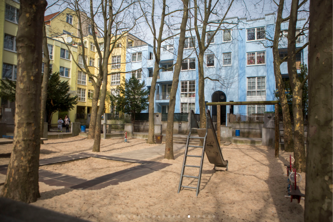 A playground with sand is located amongst a public housing project in Wedding. (Jessica Kourkounis for Keystone Crossroads)