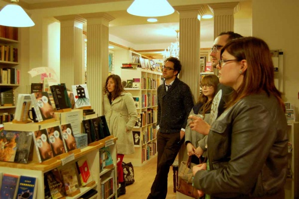 <p><p>The Spiral Salon crowd listens and reflects on the reading. (Anna Flint/for NewsWorks)</p></p>
