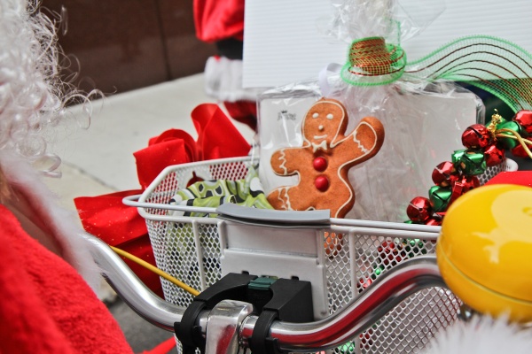<p><p>The Dranoff Santas' baskets were filled with toys and treats for needy children. "Santas can come on a bike as well as a sled, it's just as good!" said company president Carl Dranoff. (Kimberly Paynter/WHYY)</p></p>
