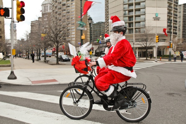 <p><p>Employees of the Dranoff Properties dressed as santa and rode bikes through Center City to deliver toys to Catholic Social Services. (Kimberly Paynter/WHYY)</p></p>
