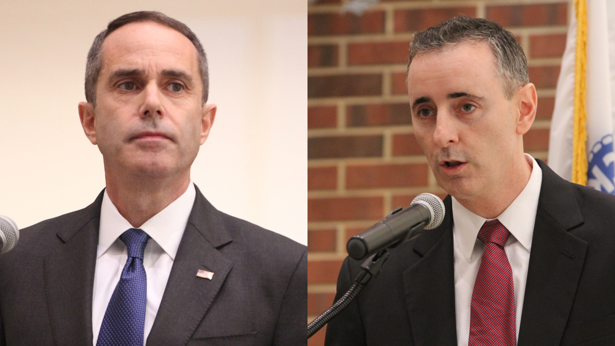  Eighth District congressional candidates Steve Santarsiero (left)and Brian Fitzpatrick face off in a debate at Bucks County College. (Emma Lee/WHYY) 