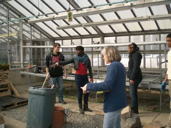 <p><p>Saul teacher Barbara Brown discusses display details with students Pajtim Saiti, Chelsea Bennett, Micet Coleman, and Rhonell Davis. (Carrie Hagen/for NewsWorks)</p></p>
