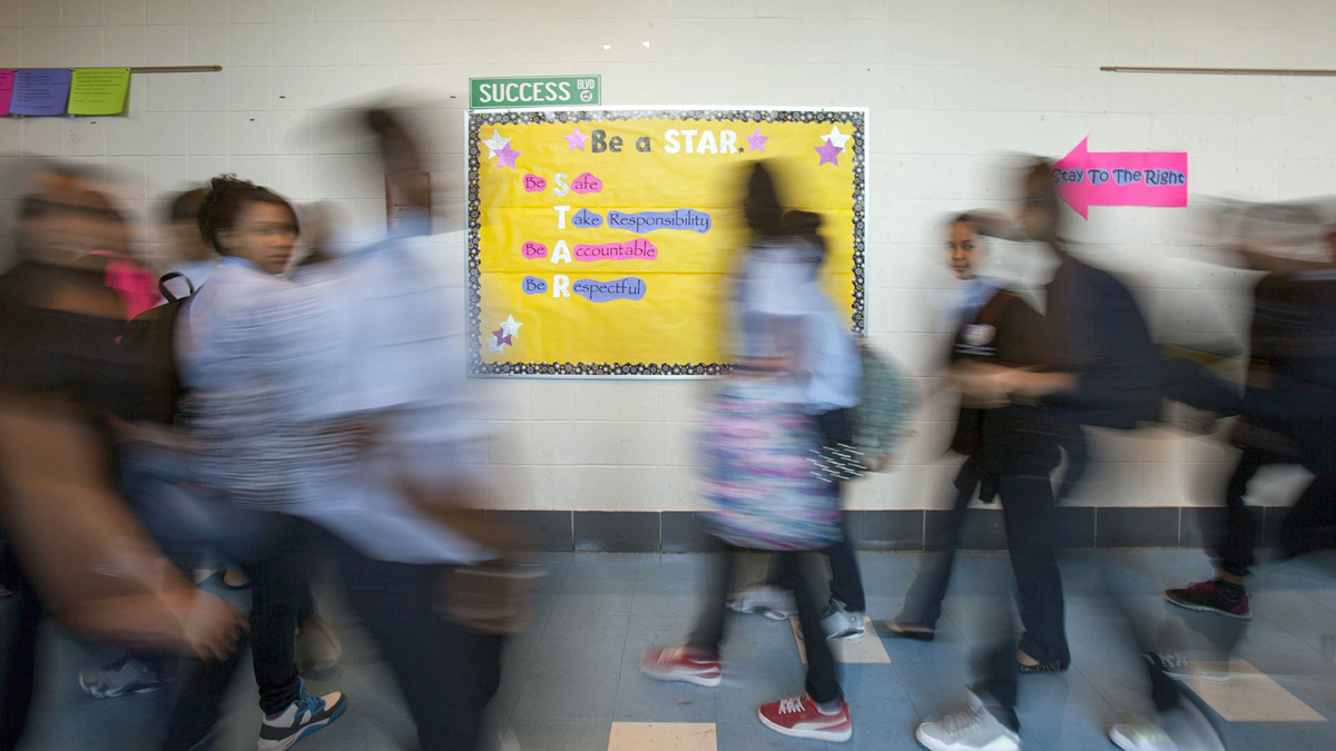 Students at the Young Women's Academy at Feltonville Arts and Sciences middle school change classes in Philadelphia