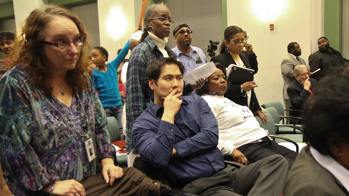  Germantown High School supporters at Thursday night's SRC meeting were stunned to learn that the school will be closing despite their efforts to save it. (Kimberly Paynter/WHYY) 