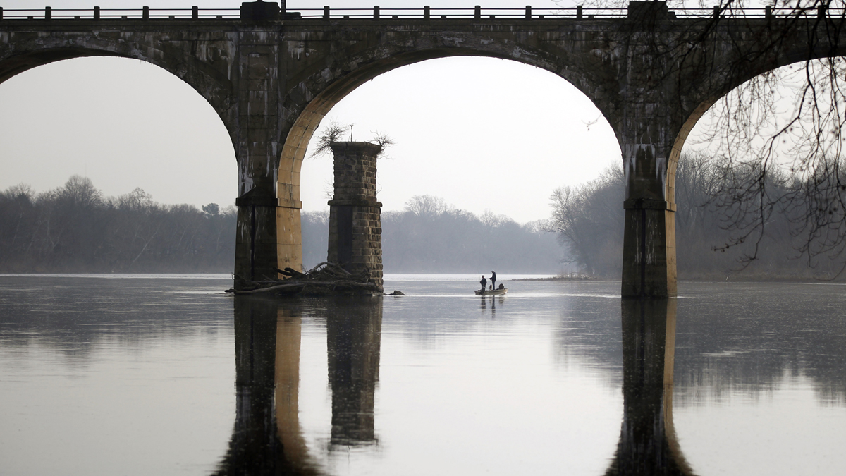  People take advantage of unseasonably warm weather to fish on the Delaware River near Yardley, Pa. (AP Photo/Mel Evans) 