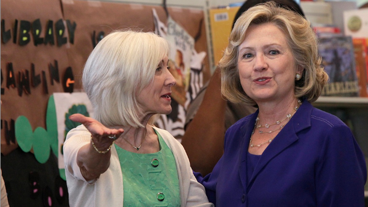  Arkansas first lady Ginger Beebe speaks with former Secretary of State Hillary Rodham Clinton at a children's library and learning center in Little Rock, Ark. on Monday. The center is being named for the former first lady and secretary of state. (AP Photo/Danny Johnston) 