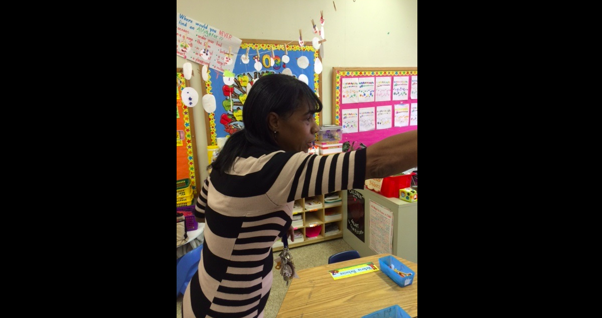  Val Spivey talks to kindergarteners at play. (Carrie Hagen/for NewsWorks) 