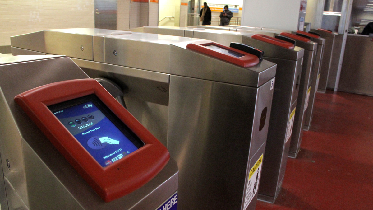  SEPTA swipe turnstiles at Dilworth Plaza. (Emma Lee/WHYY) 
