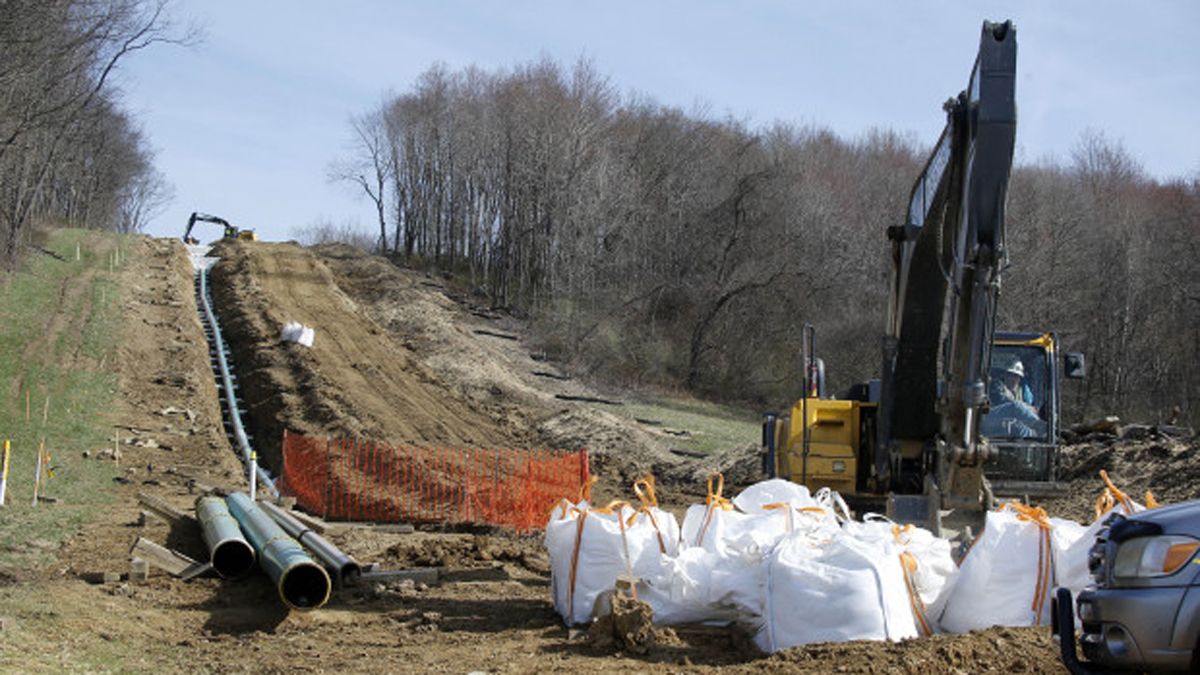  In this April 17, 2014 photo, workers construct a gas pipeline in Harmony, Pa. In a new development over the planned PennEast pipeline in the eastern part of the state, PSEG Power may sell its share. (Keith Srakocic/AP Photo) 