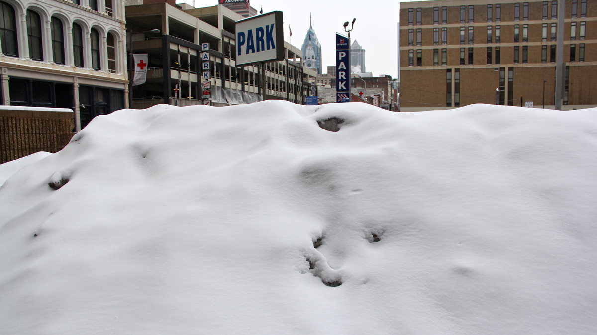  A snow pile holdout at 8th and Arch streets in Center City Philadelphia. (Emma Lee/for NewsWorks) 