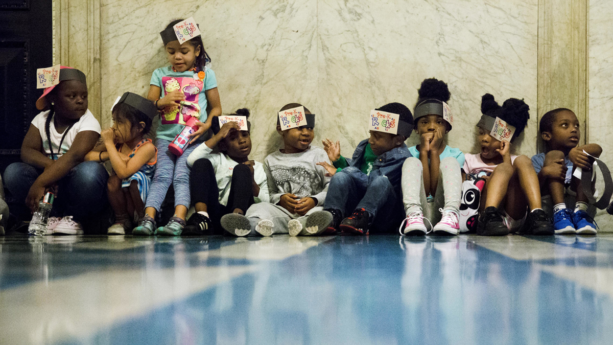 Children sat in the corridors of City Hall in Philadelphia, Wednesday, June 8, 2016. Philadelphia City Council is set to consider a sugary drink tax that Philadelphia Mayor Jim Kenney wants to pay for universal prekindergarten, community schools, park improvements, and fill a whole in the city's fund balance. (AP Photo/Matt Rourke) 